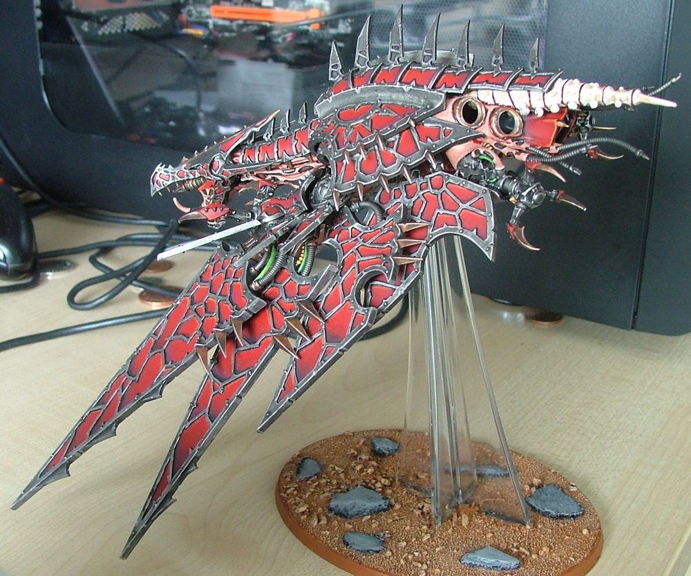 This Heldrake's base has had slate stones scattered over it to break up the base a little. These stones are simply super glued to the base just before adding the sand with PVA glue.